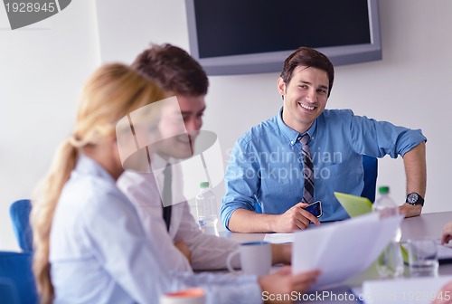 Image of business people in a meeting at office