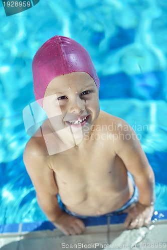 Image of happy child on swimming pool