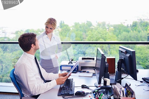 Image of business people in a meeting at office