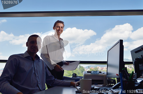 Image of business people in a meeting at office