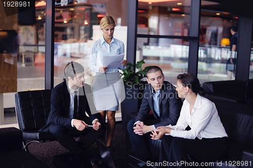 Image of business people in a meeting at office