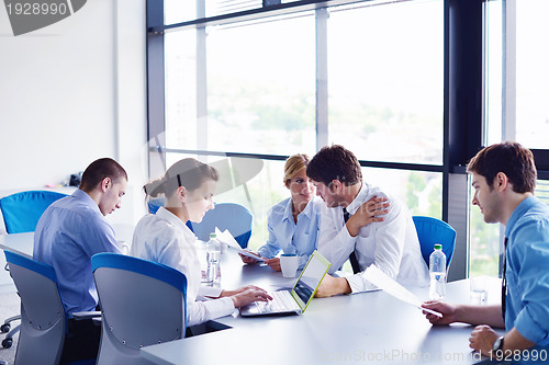 Image of business people in a meeting at office