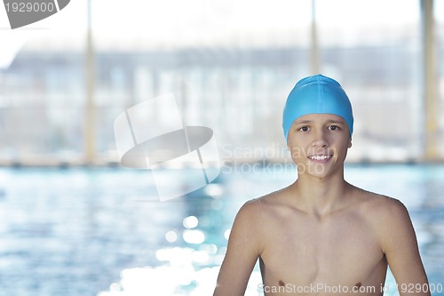 Image of happy child on swimming pool