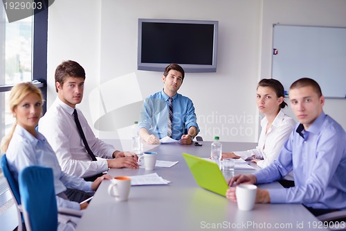 Image of business people in a meeting at office