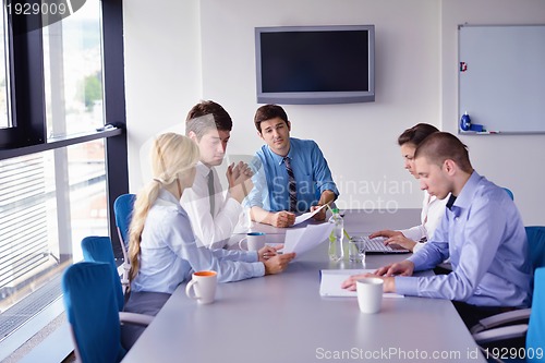 Image of business people in a meeting at office