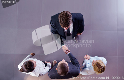 Image of business people group joining hands