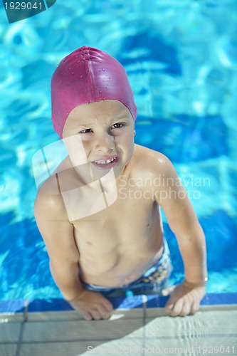 Image of happy child on swimming pool