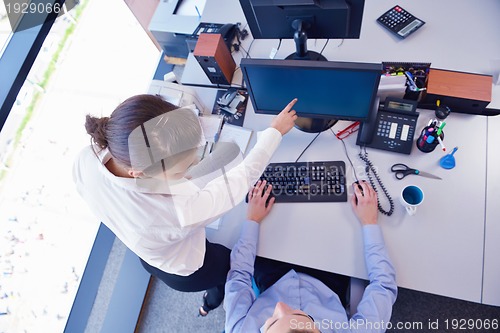 Image of business people in a meeting at office