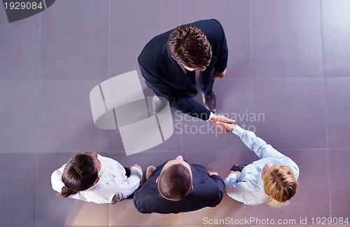 Image of business people group joining hands