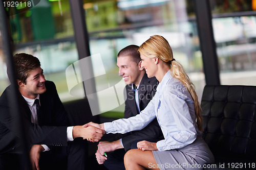 Image of business people making deal