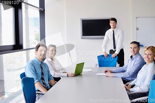 Image of business people in a meeting at office