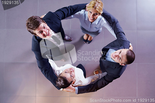 Image of business people group joining hands