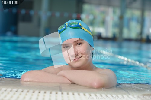Image of happy child on swimming pool