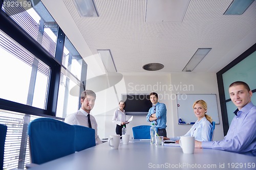Image of business people in a meeting at office