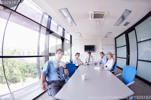 Image of business people in a meeting at office