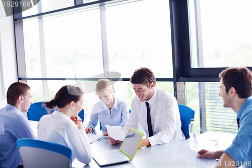 Image of business people in a meeting at office