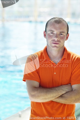Image of happy children group  at swimming pool