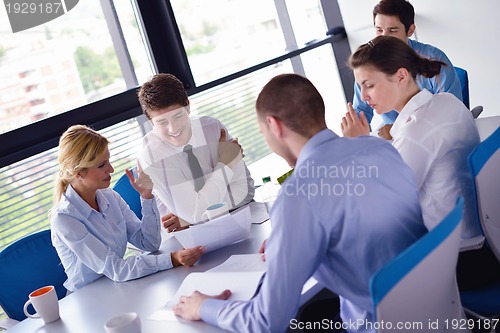 Image of business people in a meeting at office