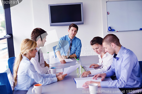 Image of business people in a meeting at office