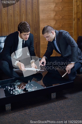 Image of business people making deal