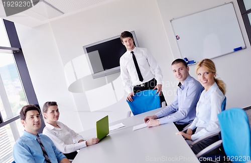 Image of business people in a meeting at office