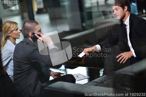Image of business people making deal