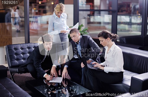Image of business people making deal