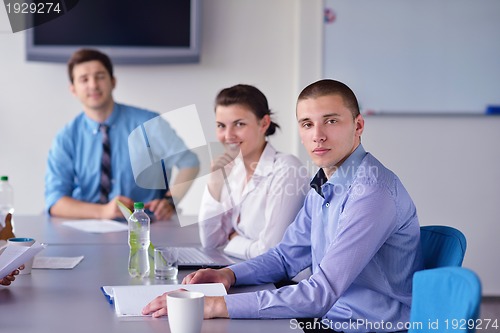 Image of business people in a meeting at office