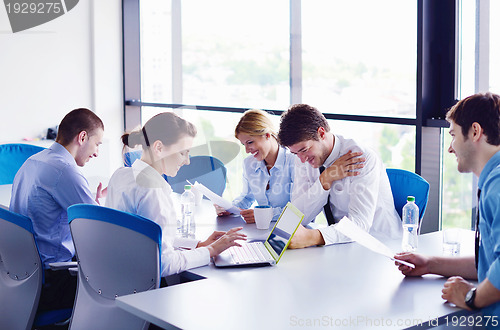 Image of business people in a meeting at office