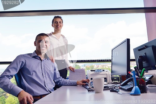 Image of business people in a meeting at office