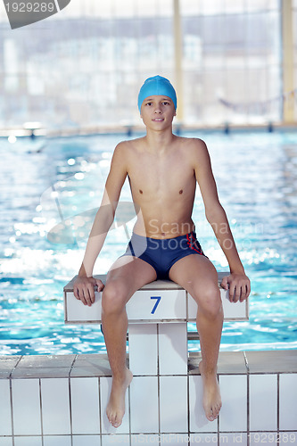 Image of happy child on swimming pool