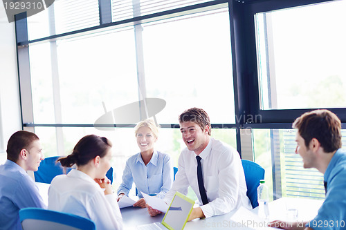 Image of business people in a meeting at office