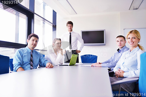 Image of business people in a meeting at office