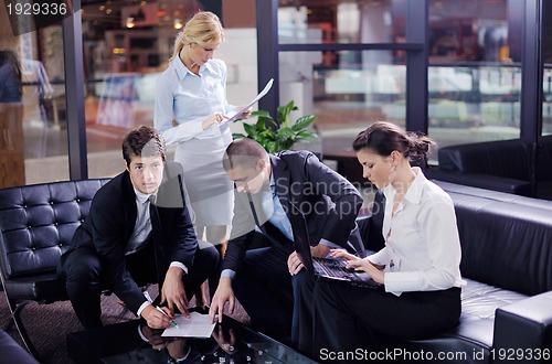 Image of business people making deal