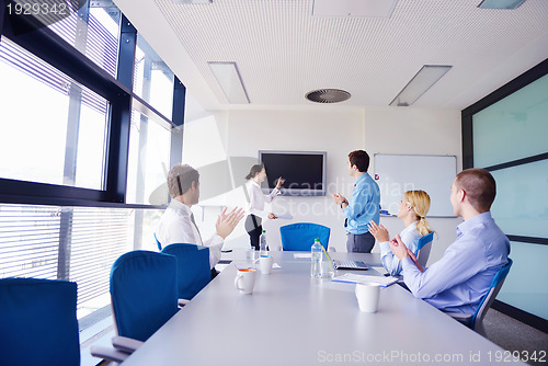 Image of business people in a meeting at office