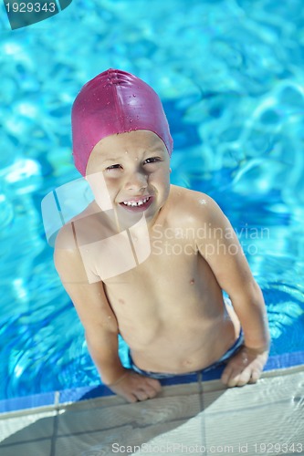 Image of happy child on swimming pool