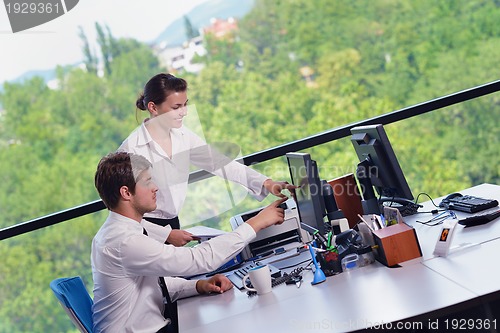 Image of business people in a meeting at office