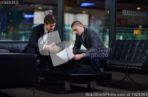 Image of business people making deal