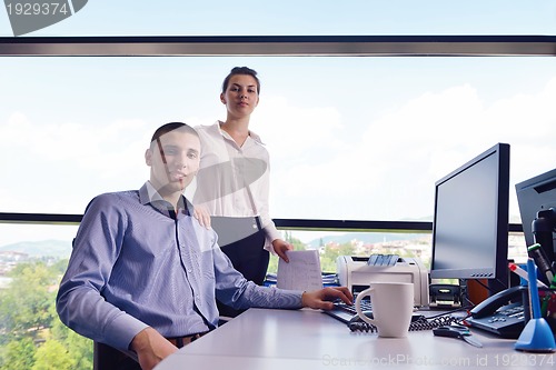 Image of business people in a meeting at office