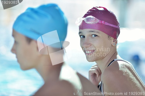 Image of happy child on swimming pool