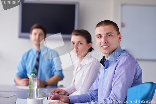 Image of business people in a meeting at office