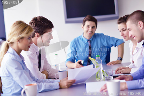 Image of business people in a meeting at office