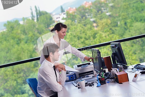 Image of business people in a meeting at office