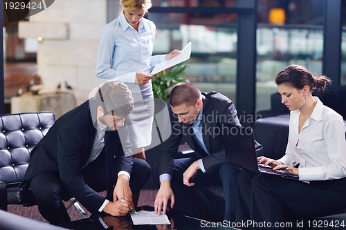 Image of business people in a meeting at office