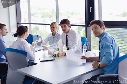 Image of business people in a meeting at office
