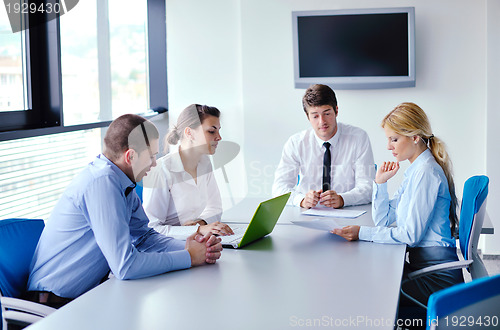 Image of business people in a meeting at office