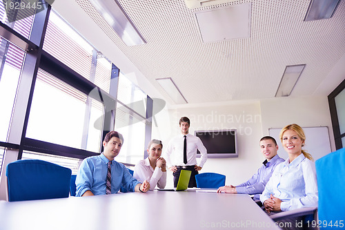 Image of business people in a meeting at office