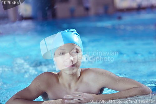 Image of happy child on swimming pool