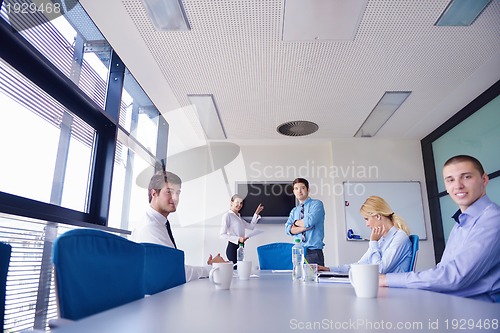 Image of business people in a meeting at office