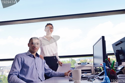 Image of business people in a meeting at office